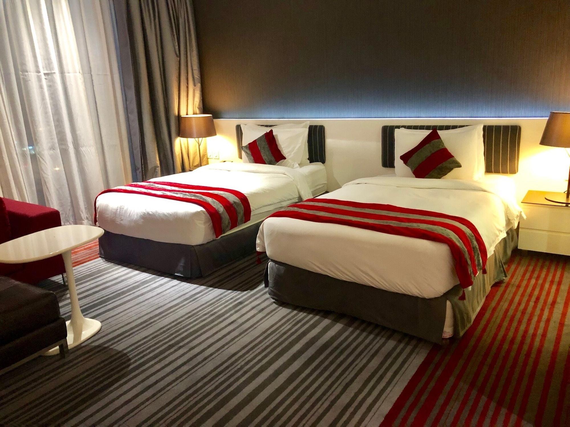 מנאמה Ramee Grand Hotel And Spa מראה חיצוני תמונה A room at the hotel