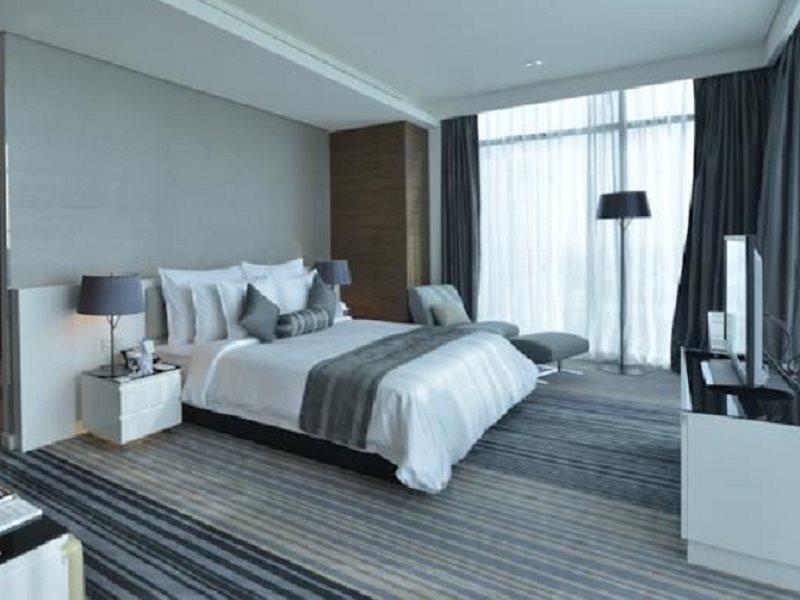 מנאמה Ramee Grand Hotel And Spa מראה חיצוני תמונה A bedroom at the hotel